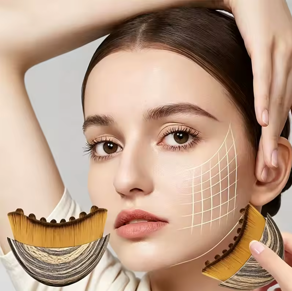 Close-up of a woman using the lymphatic brush along the jawline
